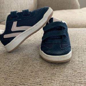 Navy and tan sneakers